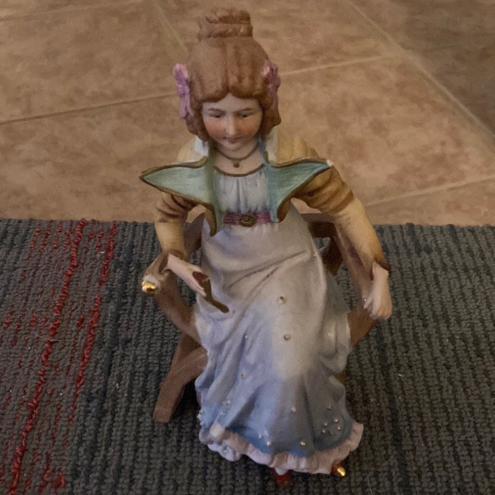 Vintage lady of the 1800’s figurine, made in Germany is numbered,